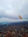 A Pegasus airline plane comes in for landing in Istanbul among clouds at altitude close up of its