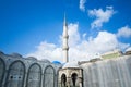 Blue Mosque minaret tower against blue sky during reconstruction Royalty Free Stock Photo