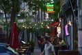 Street with cafe and bright lights in Karakoy,Istanbul at summer evening,dusk. Royalty Free Stock Photo