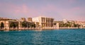 ISTANBUL, TURKEY - 09 07 2020: Sunset view on the bank of Bosporus Strait with Dolmabahce Palace, a museum in ornate