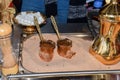 Istanbul, Turkey, 20.12.2019: Traditional coffee stall stand, vendor making fresh coffee on sand