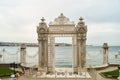 Istanbul, Turkey - 05.05.2021: View over the Dolmabahce gate in the eponymous palace. Royalty Free Stock Photo