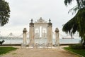 Istanbul, Turkey - 05.05.2021: View over the Dolmabahce gate in the eponymous palace. Royalty Free Stock Photo