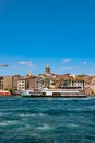 Istanbul view. Ferry and Galata Tower at daytime.