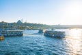 Istanbul view from Galata Bridge. Ferries on Golden Horn and Suleymaniye Mosque Royalty Free Stock Photo