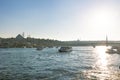 Istanbul view. Golden Horn and Suleymaniye Mosque at sunset with ferries