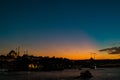 Istanbul view at sunset with orange and blue sky. Islamic concept photo