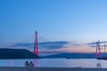 istanbul yavuz sultan selim bridge taken from the beach towards sunset people dogs Royalty Free Stock Photo