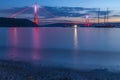 istanbul yavuz sultan selim bridge taken from the beach towards sunset people dogs Royalty Free Stock Photo