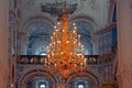 Church ceiling chandelier with candles. The interior of the temple Royalty Free Stock Photo