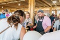 Istra, Russia, 04 August 2023. Farmers selling cheese of their own production. Cheese fair of farm products Cheese Pir