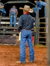 Itaja, Goias, Brazil - 04 22 2023: Person at a bull riding event in a rodeo arena