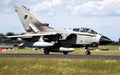 Italian Air Force Panavia Tornado bomber jet plane taxiing after landing on Jagel Air Base. Germany- June 13, 2019 Royalty Free Stock Photo