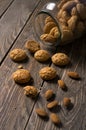 Italian amaretti biscuits poured out from a jar. Crunchy almond cookies with whole almonds Royalty Free Stock Photo