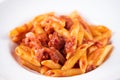 Italian Amatriciana Pasta with tomato sauce and smoked bacon Royalty Free Stock Photo