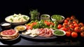 italian antipasti on a black background with vegetables and cheese