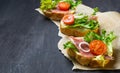 Italian antipasti crostini with ham, salad and tomato Royalty Free Stock Photo