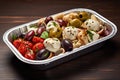 Italian Antipasti Set with Small Peppers Stuffed with Cream Cheese, Pickled Olives, Marinated Mushrooms,