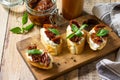 Italian Antipasti snacks for Wine. Brushetta with Soft Cheese and Dried Tomatoes