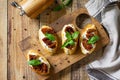 Italian Antipasti snacks for Wine. Brushetta with Soft Cheese and Dried Tomatoes Royalty Free Stock Photo