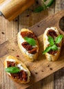 Italian Antipasti snacks for Wine. Brushetta with Soft Cheese and Dried Tomatoes Royalty Free Stock Photo