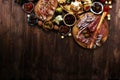 Italian antipasti wine snacks set. Cheese variety, Mediterranean olives, crudo, Prosciutto di Parma, salami and wine in glasses Royalty Free Stock Photo