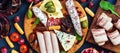 Italian antipasti wine snacks set, prosciutto,cheese, olives, grapes, sausage and cold meat. Top view, flat lay,banner Royalty Free Stock Photo