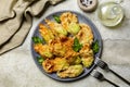 Italian appetizer. Fried in a batter Zucchini Flowers stuffed with ricotta Royalty Free Stock Photo