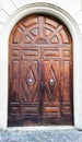 Italian architecture detail. Old medieval style front door Royalty Free Stock Photo