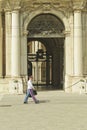 Italian army cadets walking in front of the historical gate of the army acadamy