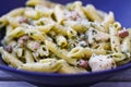 Italian bacon and Parmesan Penne Pasta with chicken in a bowl. Royalty Free Stock Photo