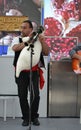 Italian bagpiper from Sicily at the EXPO Milano 2015. Royalty Free Stock Photo