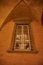 Italian barred window on the wall Royalty Free Stock Photo