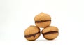 Italian biscuit Baci di Dama, lady kisses translated into English, on white background