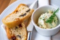 Italian bread with dried tomato and olive, chive butter with dill in bowl Royalty Free Stock Photo