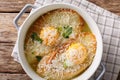 Italian bread Pawese soup close-up in a saucepan. horizontal top