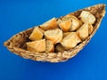 Italian bread slices on a braided basked