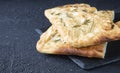 Italian bread - traditional two pieces of focaccia. Focaccia consists of flour, olive oil, water, Fleur de sel, sugar and yeast, Royalty Free Stock Photo