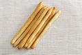 Italian breadsticks on fabric background