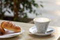 Italian breakfast , cappuccino and brioche Royalty Free Stock Photo