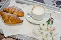 Italian breakfast - cappuccino and croissant Royalty Free Stock Photo