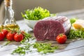 Italian bresaola with arugula tomatoes and olive oil