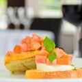 Italian Bruschetta with cheese tomatoes and a basil dressing Royalty Free Stock Photo