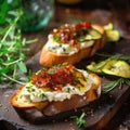 Italian bruschetta with fried tomatoes, mozzarella cheese and herbs on a cutting board
