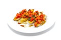 Italian Bruschetta on toasted bread, topped with fresh chopped red tomato salad and basil, caramelized balsamic vinegar drizzle Royalty Free Stock Photo