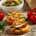 Italian bruschetta with tomato, onion and bell petsem, sample focus Royalty Free Stock Photo
