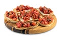 Italian bruschetta on a wooden cutting board