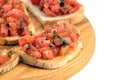 Italian bruschetta on a wooden cutting board