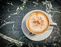 Italian caffelatte cup on green marble table Royalty Free Stock Photo