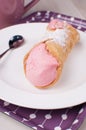 Italian cannoli dessert with strawberry cream